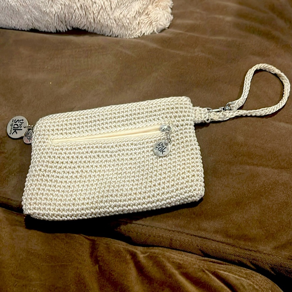 The Sak cream colored crochet clutch. 7” wide. Will bundle make offer!!